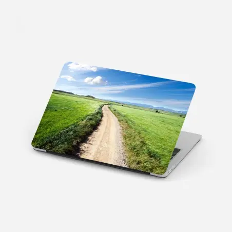 Pegatina para portátil camino campestre hacia montañas bajo cielo azul – Pixers®