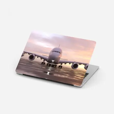 Pegatina para portátil avión frontal al atardecer en pista – Pixers®