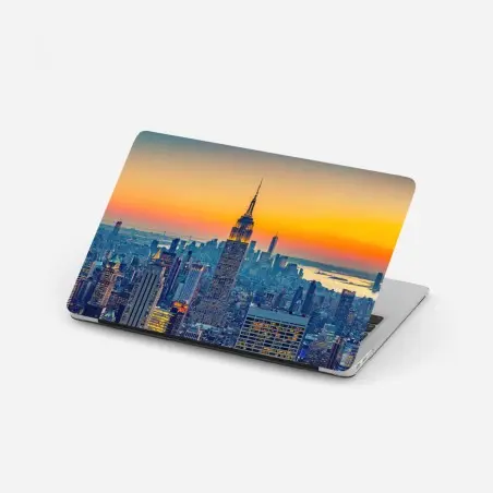 Pegatina para portátil puesta de sol sobre el skyline de Nueva York – Pixers®