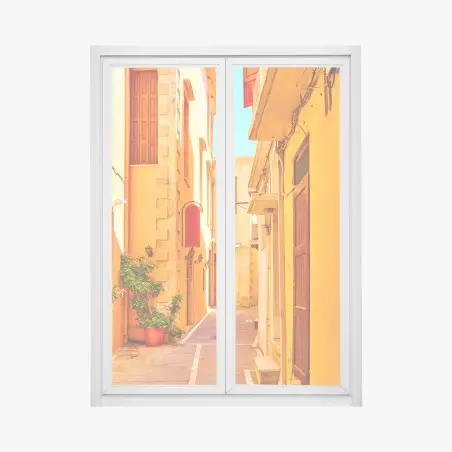 Pegatina para ventana calle estrecha de Rethymno bañada por el sol – Pixers®