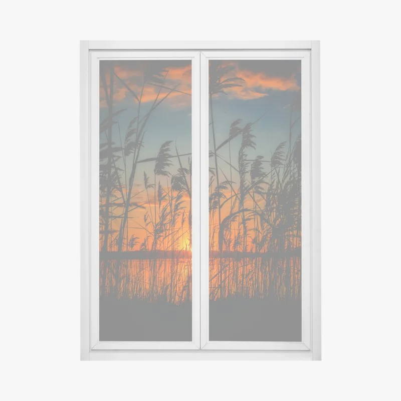 Pegatina para ventana atardecer entre juncos en el lago