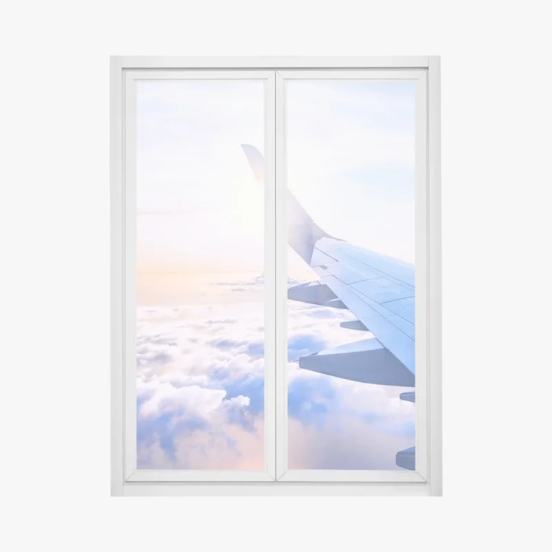 Pegatina para ventana vista aérea desde el ala del avión sobre nubes al amanecer
