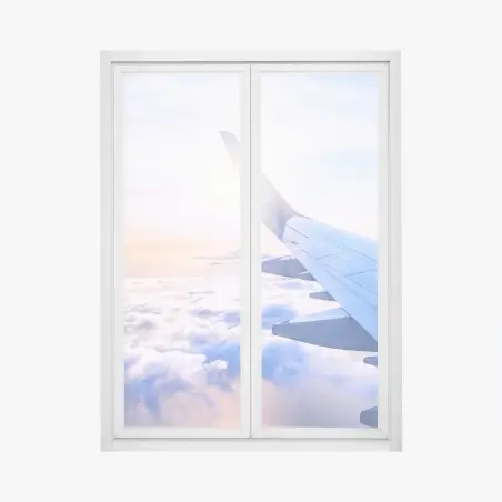 Pegatina para ventana vista aérea desde el ala del avión sobre nubes al amanecer – Pixers®