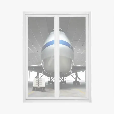 Pegatina para ventana vista frontal e imponente de avión en hangar – Pixers®