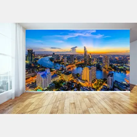 Fotomural atardecer urbano sobre el río iluminado – Pixers®