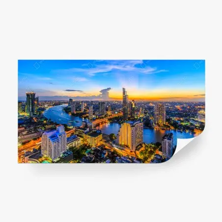 Fotomural atardecer urbano sobre el río iluminado – Pixers®