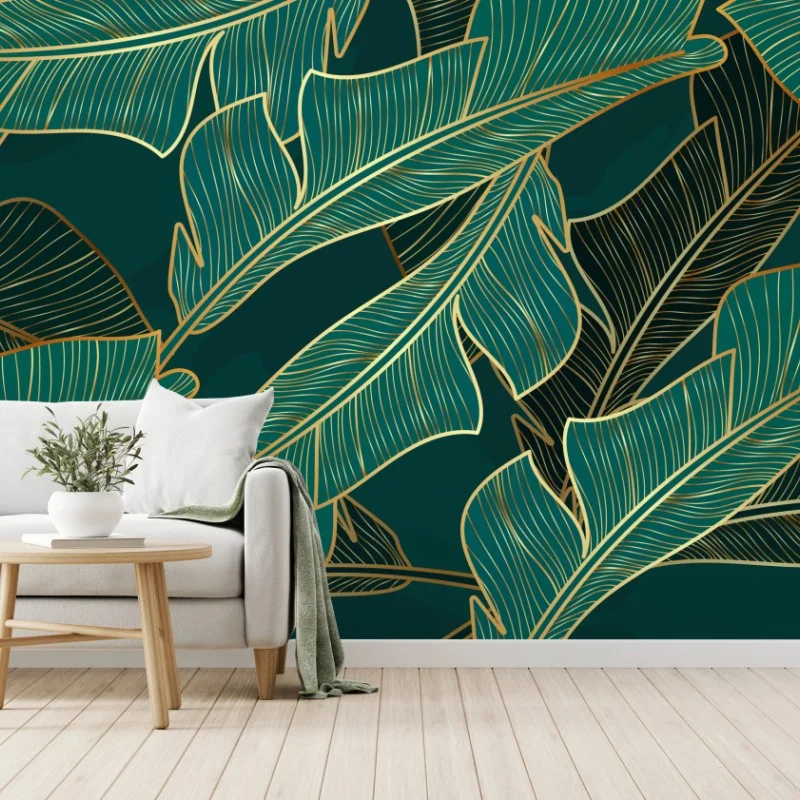 Fotomural diseño de hojas tropicales doradas sobre fondo verde oscuro