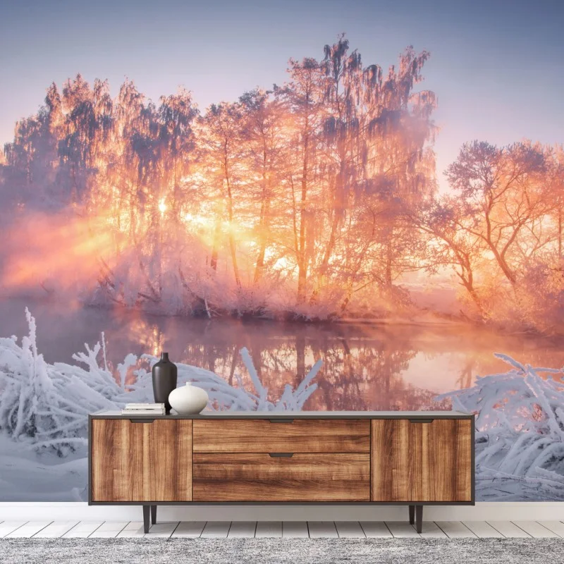 Fotomural amanecer invernal entre árboles helados