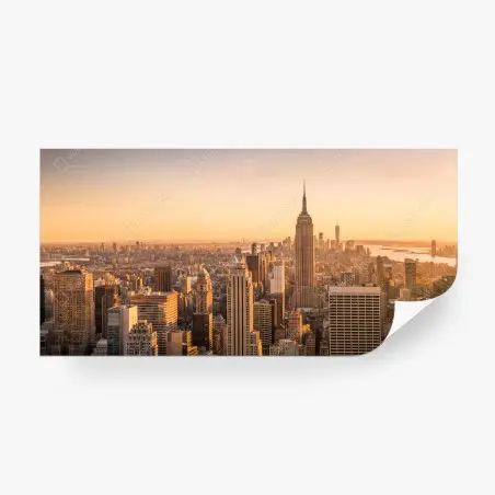 Fotomural amanecer dorado sobre el perfil urbano de Nueva York – Pixers®