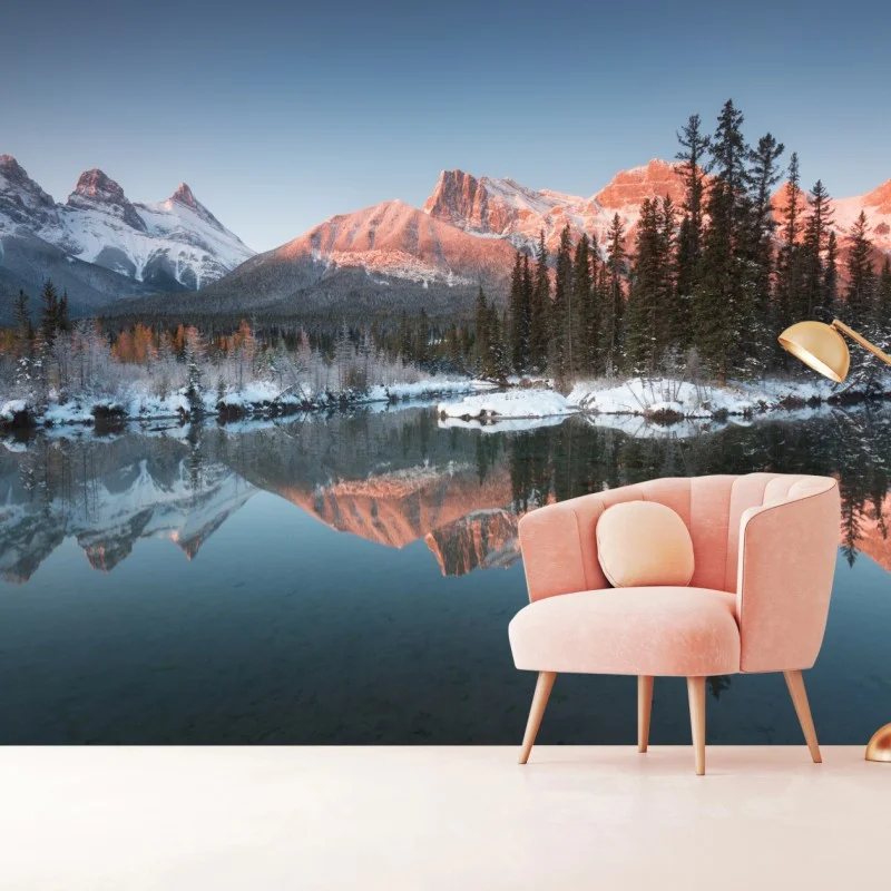 Fotomural amanecer en montañas nevadas con reflejo en lago