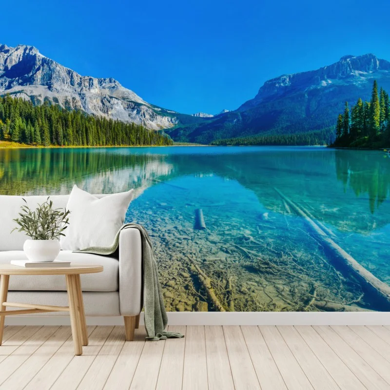Fotomural lago de montaña con aguas cristalinas y reflejo sereno
