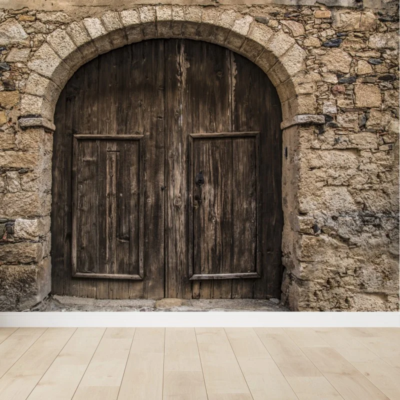 Fotomural puerta rústica de madera con arco de piedra