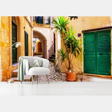 Fotomural rincón mediterráneo en calle empedrada – Pixers®