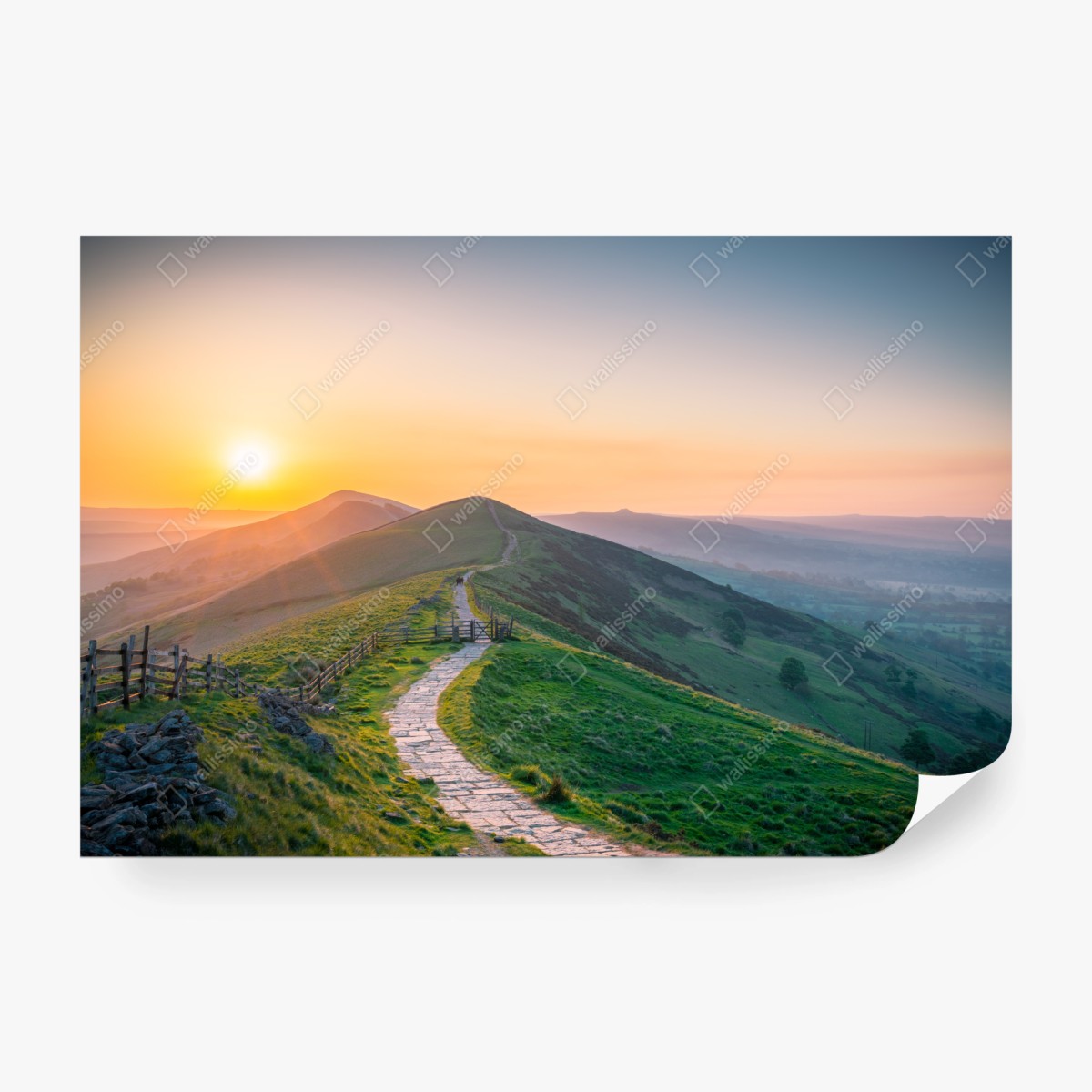 Fotomural amanecer sobre colinas y sendero de piedra – Pixers®