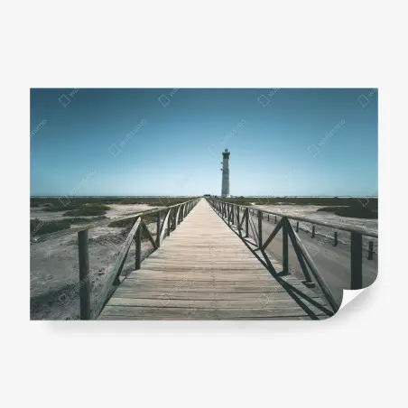 Fotomural camino de madera hacia el faro en la costa – Pixers®