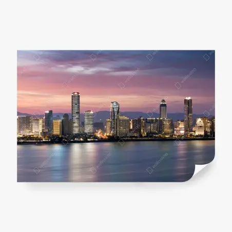 Fotomural horizonte urbano al atardecer con reflejos – Pixers®