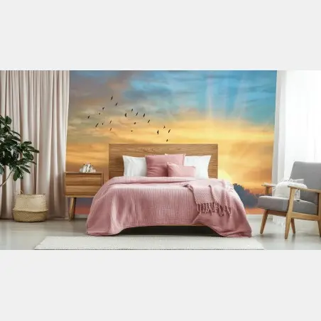 Fotomural amanecer dorado con aves en vuelo – Pixers®