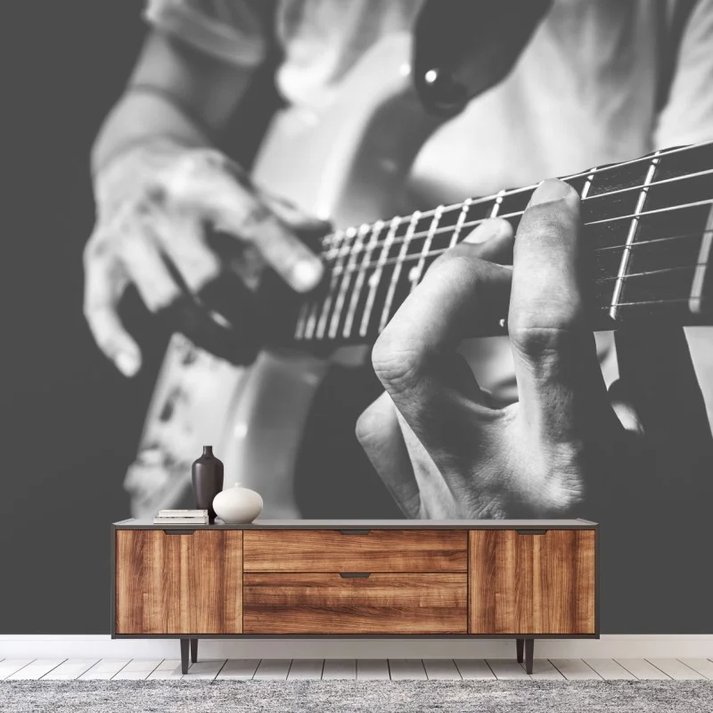 Fotomural manos sobre el mástil de la guitarra eléctrica