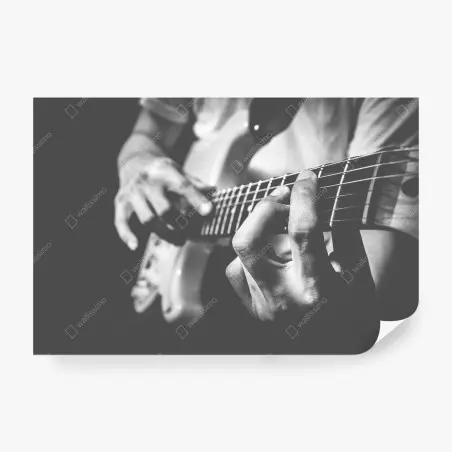 Fotomural manos sobre el mástil de la guitarra eléctrica – Pixers®