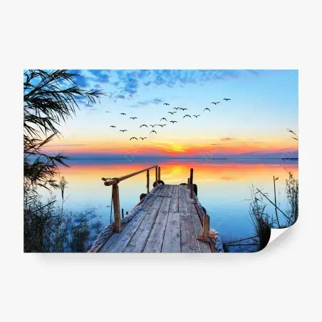 Fotomural muelle al amanecer sobre aguas tranquilas – Pixers®