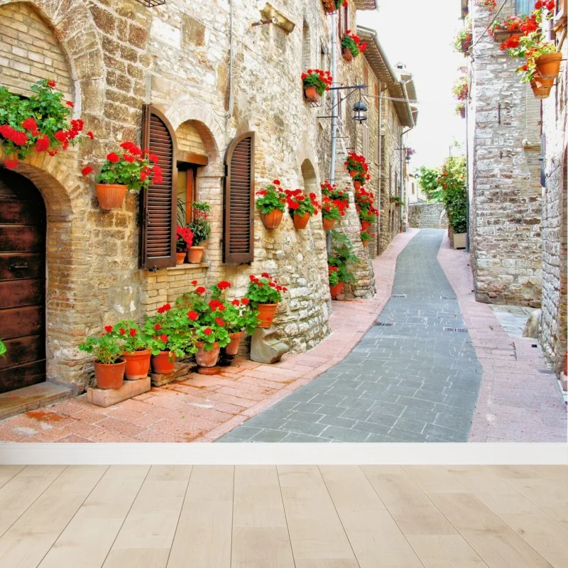 Fotomural callejón florido en pueblo rústico