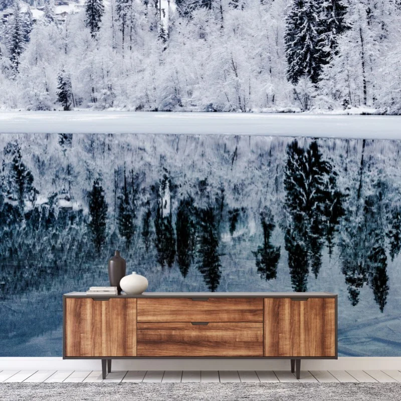Fotomural serenidad invernal: bosque nevado reflejado