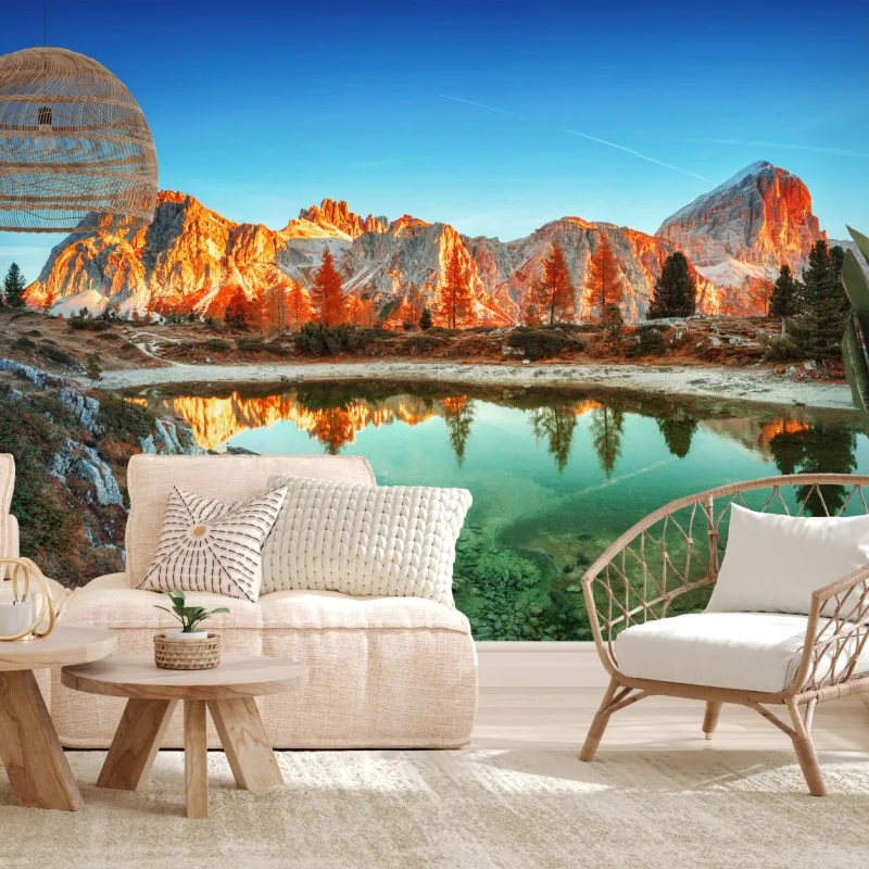 Fotomural amanecer en montañas rocosas con reflejo en lago