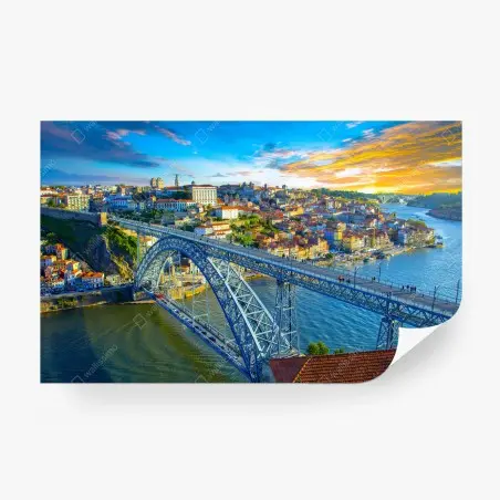 Fotomural atardecer vibrante sobre el puente y la ciudad – Pixers®