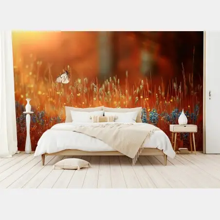 Fotomural amanecer dorado con mariposa en pradera – Pixers®