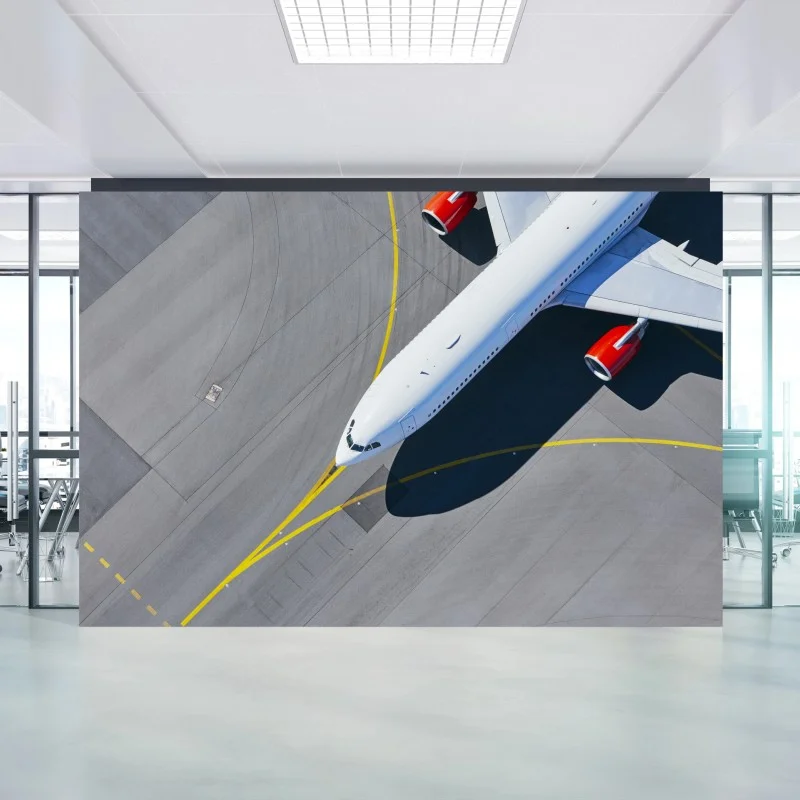 Fotomural avión comercial sobre la pista desde el aire