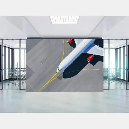 Fotomural avión comercial sobre la pista desde el aire – Pixers®