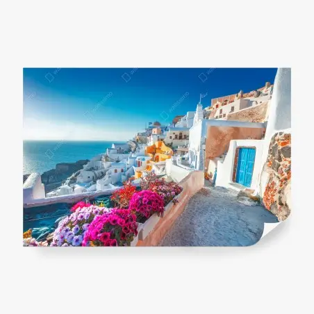 Fotomural paisaje costero de Santorini con casas blancas y flores – Pixers®