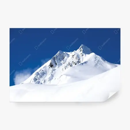 Fotomural cima nevada bajo cielo azul – Pixers®
