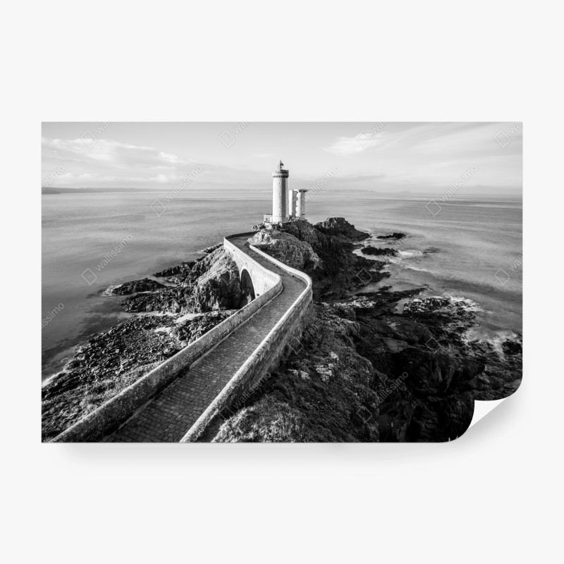 Fotomural camino hacia el faro en la costa rocosa