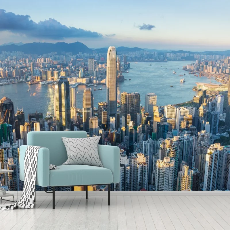 Fotomural atardecer sobre Hong Kong: horizonte urbano dorado