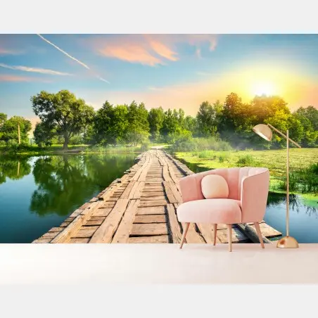 Fotomural puente rústico sobre lago al atardecer – Pixers®
