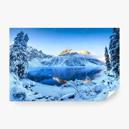 Fotomural amanecer sobre lago helado en montañas nevadas – Pixers®
