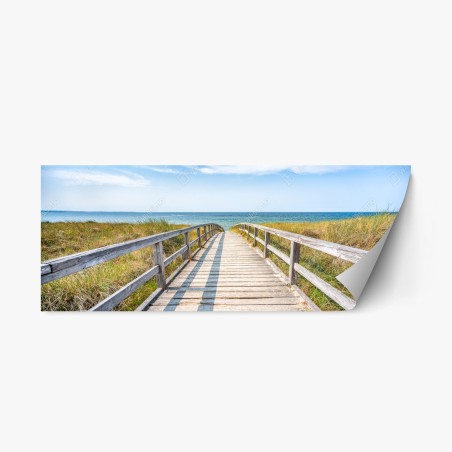 Pegatina reposicionable pasarela de madera hacia el mar entre dunas – Pixers®