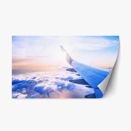Pegatina reposicionable vista aérea desde el ala del avión sobre nubes al amanecer – Pixers®