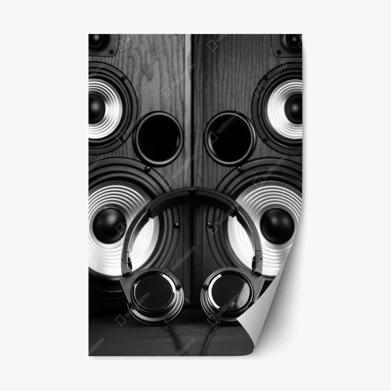 Pegatina reposicionable auriculares frente a altavoces en blanco y negro