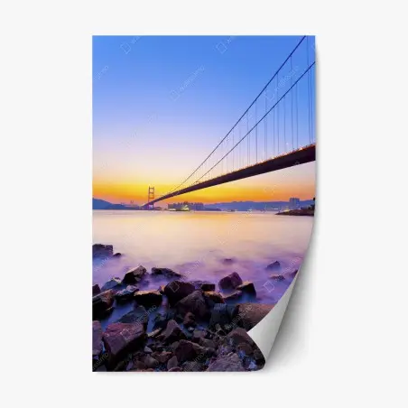 Pegatina reposicionable puente colgante al atardecer sobre la costa – Pixers®