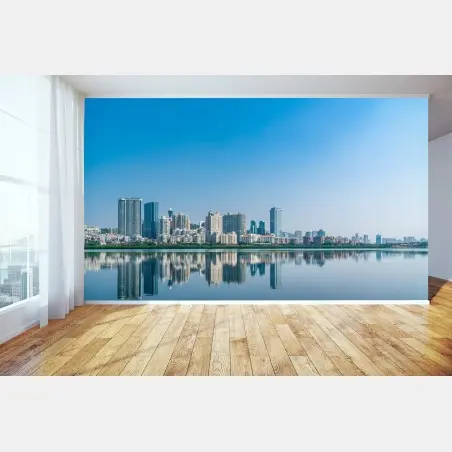 Fotomural panorama urbano con reflejo en el agua – Pixers®