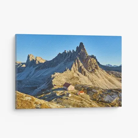 Cuadro en lienzo refugio alpino bajo picos escarpados – Pixers®