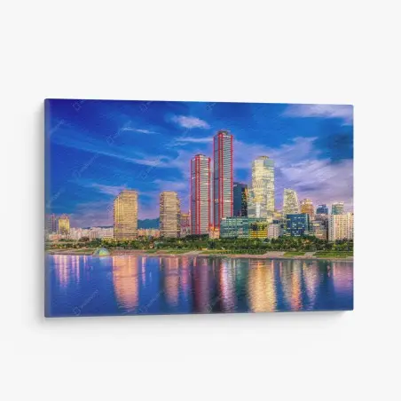 Cuadro en lienzo horizonte urbano iluminado al atardecer – Pixers®