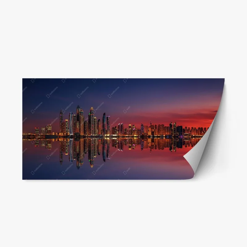 Pegatina reposicionable skyline iluminado al atardecer con reflejos