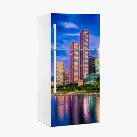 Pegatina para frigorífico horizonte urbano iluminado al atardecer – Pixers®