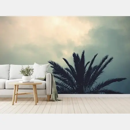 Fotomural palmera bajo cielo tormentoso – Pixers®