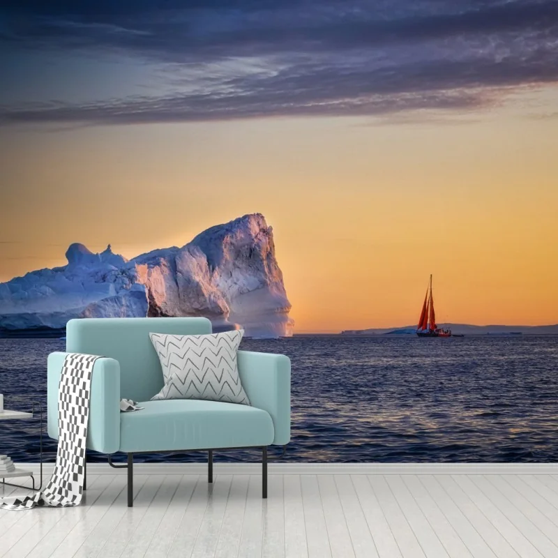Fotomural amanecer dorado sobre iceberg y velero