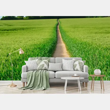 Fotomural camino entre campos verdes al horizonte – Pixers®