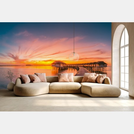 Fotomural pasarela hacia bungalows sobre el agua al atardecer – Pixers®